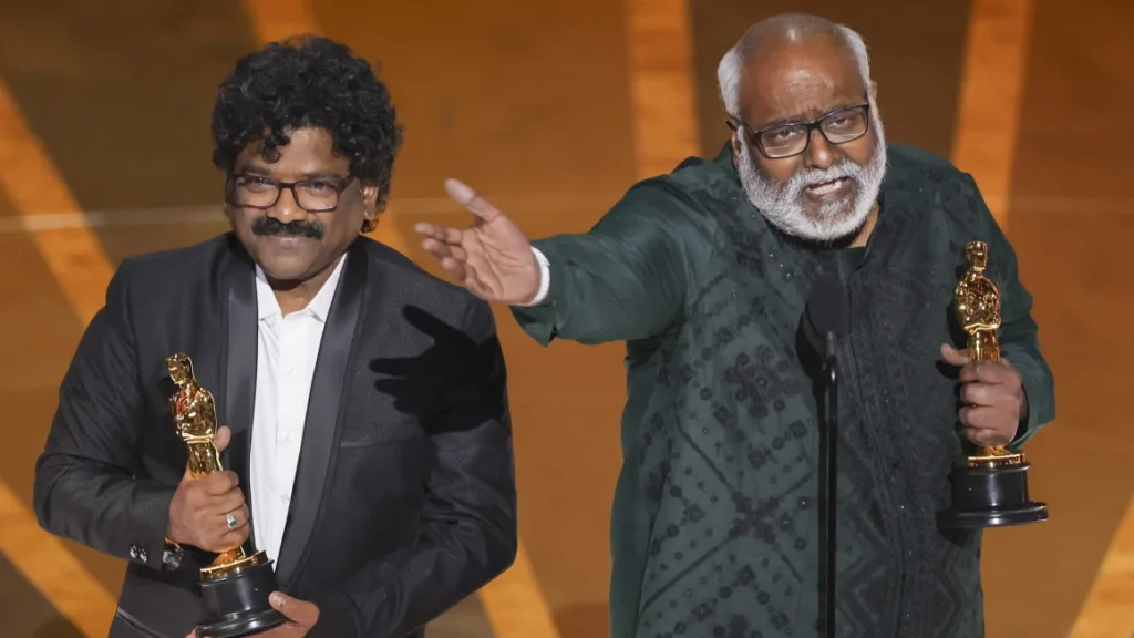 M.M. Keeravani and Chandrabose win the Oscar for Best Original Song for Naatu Naatu from RRR during the Oscars show at the 95th Academy Awards in Hollywood